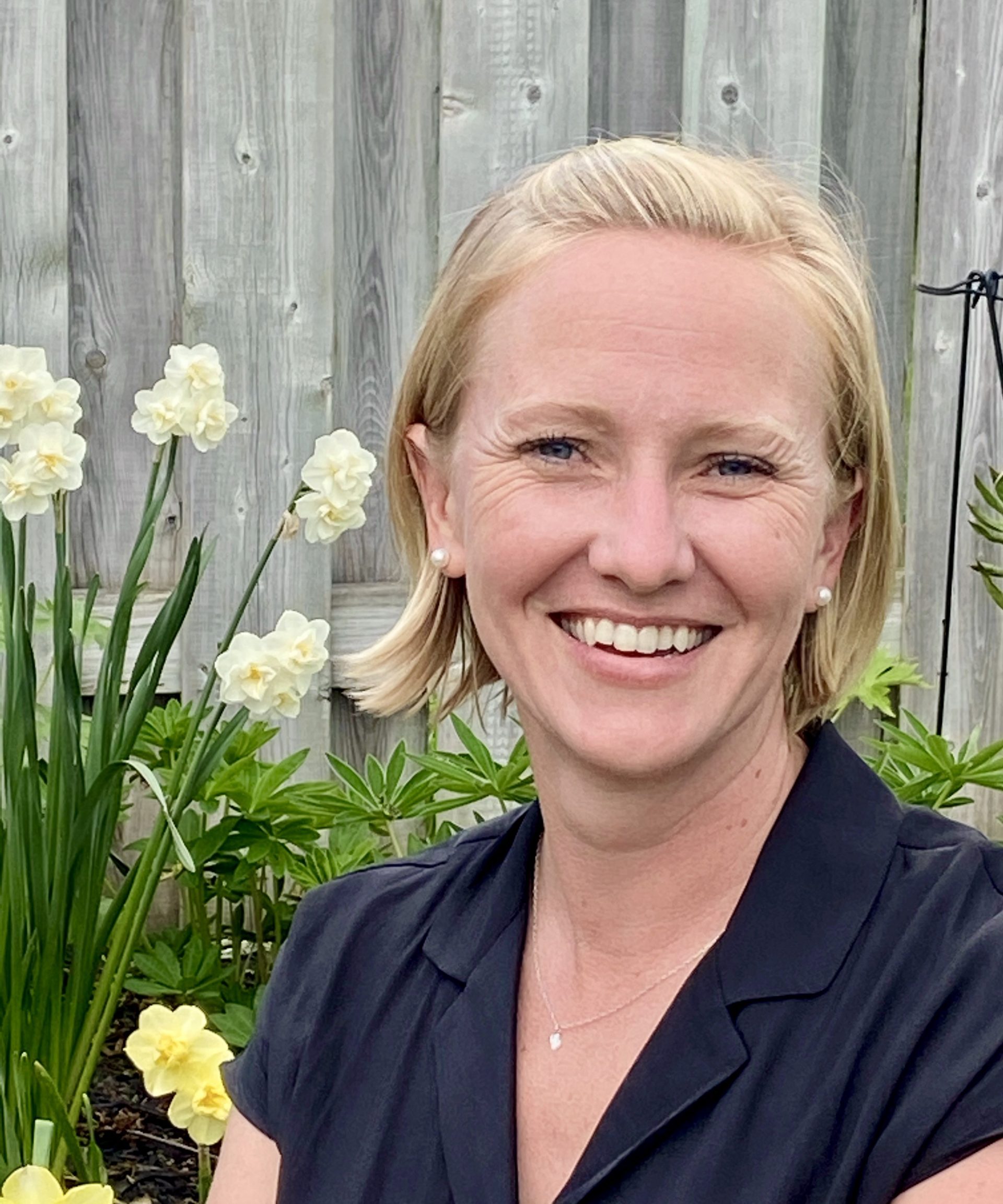 Meaghan Middleton, Chair of the GHS Board of Directors, smiling outdoors
